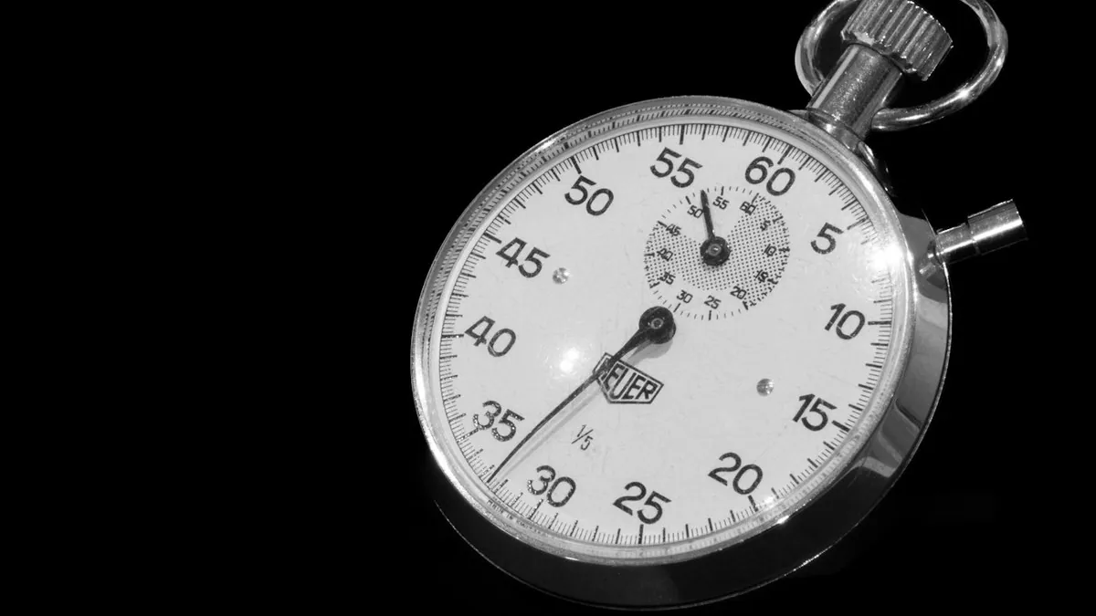 Close-up of a stopwatch on a black background